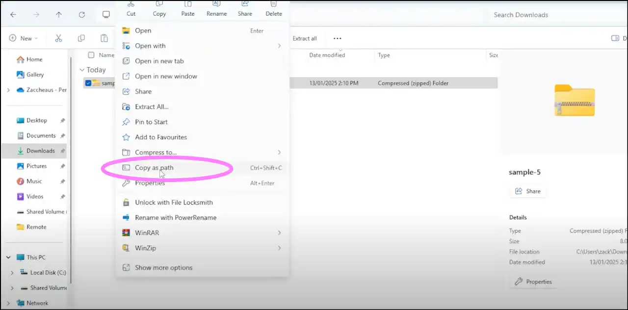 Right click corrupted zip file to open up command line